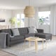 Modern living room with grey MORABO sofa, wooden coffee table, large window, and wicker pendant light.