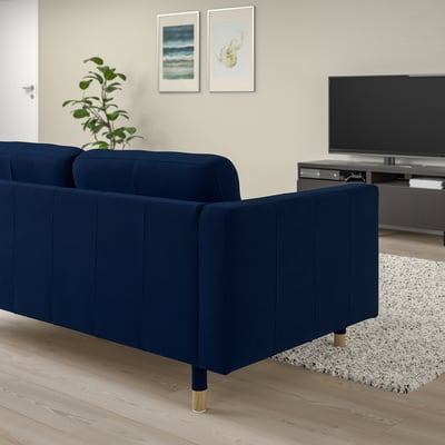 Blue velvet MORABO sofa, sleek & modern, with gold legs. Its large, fitting well in spacious living rooms.