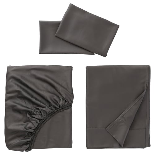 Three grey bed linens displayed: smoothly folded sheets and a pillowcase.