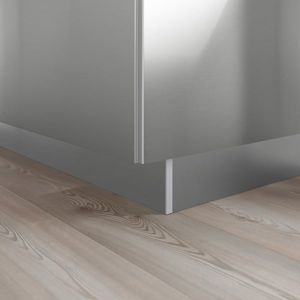 Stainless steel kitchen cabinet front, part of NOGSTA series, with a sleek, industrial look, attached to wooden floor.