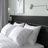NORDLI Bed frame with storage and mattress, with headboard anthracite/Vågstranda plush, King