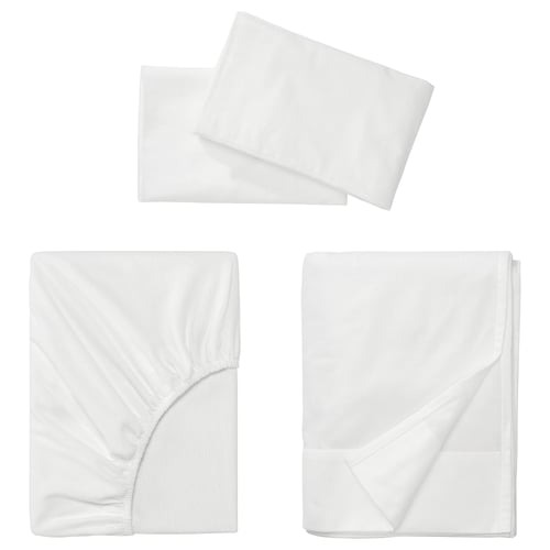 Three white cotton flannel bedding items: two pillowcases and one flat sheet, neatly folded.