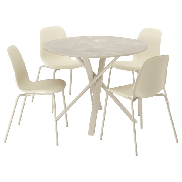 NORRMJÖLE dining set: beige round table, four shell chairs, metal legs