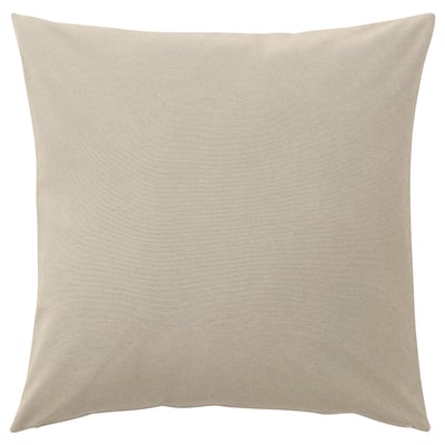 A rectangular PARADISBUSKE throw pillow in a neutral beige colour with a textured, wave-like design, made from recycled cotton and polyester.