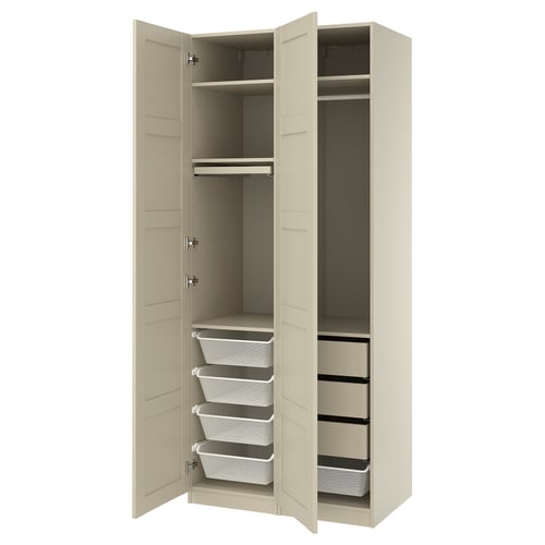 A beige PAX wardrobe with open doors, featuring shelves, drawers, and mesh baskets.