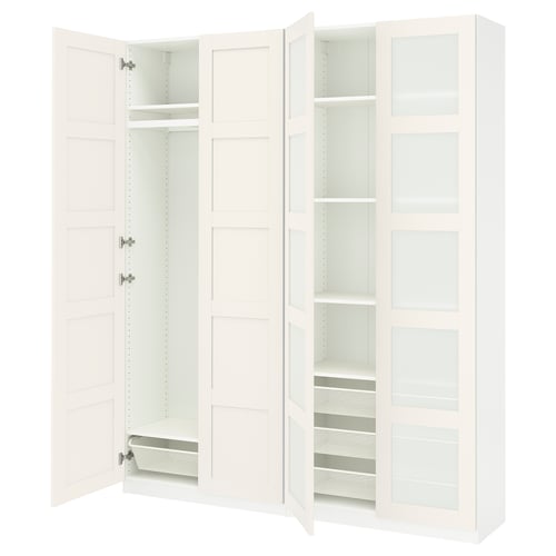 An open white PAX wardrobe with glass doors, featuring shelves and a mesh basket.