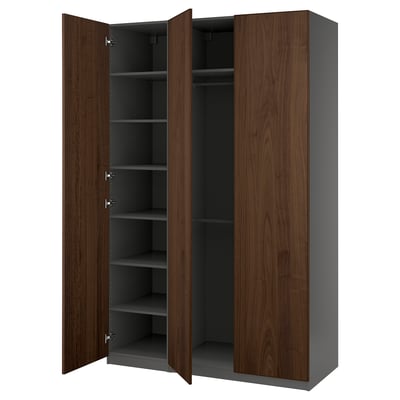 Image shows IKEA PAX wardrobe in walnut with dark grey interiors, adjustable shelves, and soft close doors.