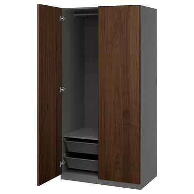Dark grey PAX wardrobe with walnut trim, open doors showing mesh baskets.