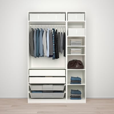 A white wardrobe with hanging shirts, folded clothes on shelves, and a handbag.