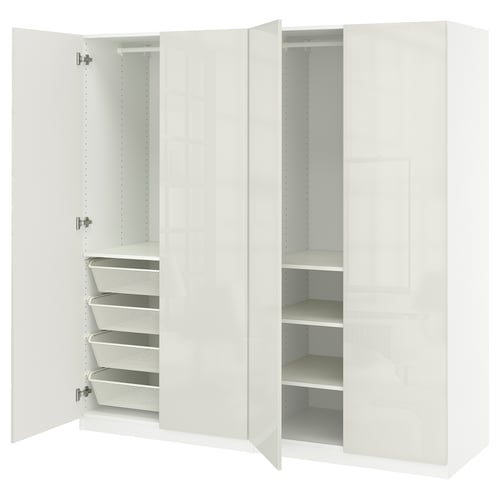 A white PAX wardrobe with mesh drawers and shelves.