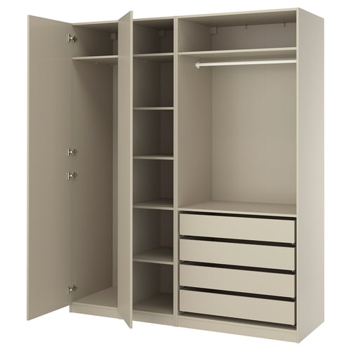 Depicts an off-white ikea PAX wardrobe with open doors, showing shelves and drawers inside.