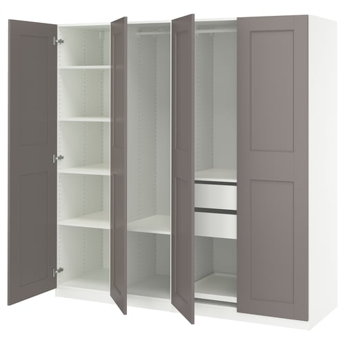 An open PAX wardrobe in grey with multiple shelves and compartments.