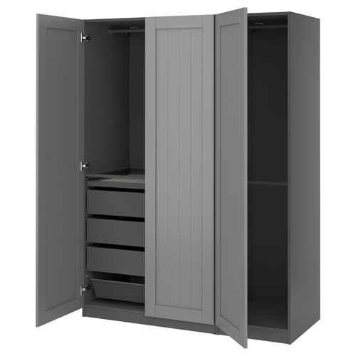 A grey PAX wardrobe with open doors, featuring drawers and shelves inside.