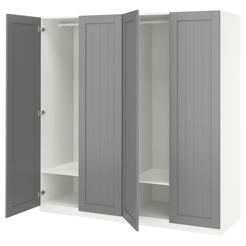 A grey PAX wardrobe with open doors, revealing shelves and a hanging rod inside. Its made of particleboard and fiberboard with a smooth, flat design.