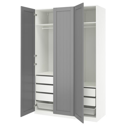 An open grey PAX wardrobe with shelves and drawers.