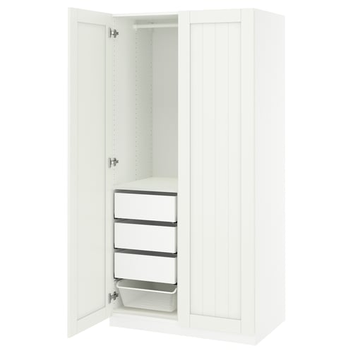 A white PAX wardrobe with open doors, revealing shelves and drawers for storage.