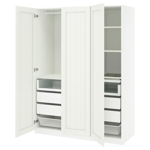 White PAX wardrobe with open doors, shelves, drawers, and mesh baskets.