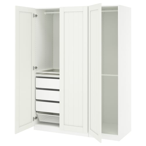 White PAX wardrobe with mesh basket, pull-out trays, and adjustable feet.