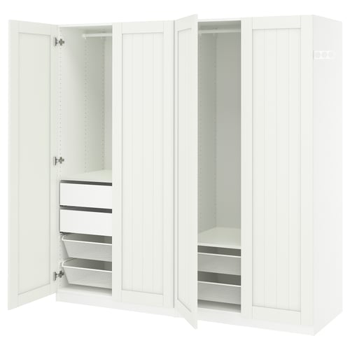 An open white PAX wardrobe with multiple storage compartments including shelves and drawers.