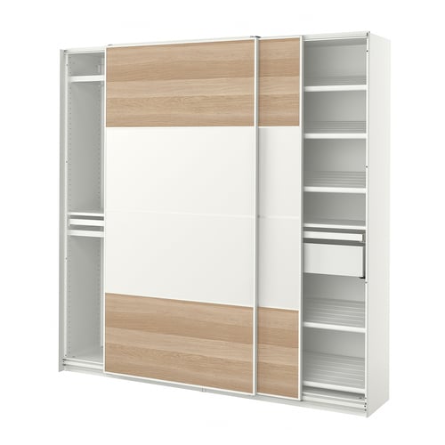 An open white PAX wardrobe with wooden accents, featuring shelves and hanging space.