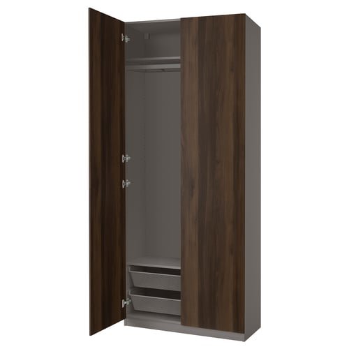 PAX wardrobe, dark wood, narrow frame, soft-closing doors, mesh shelves.
