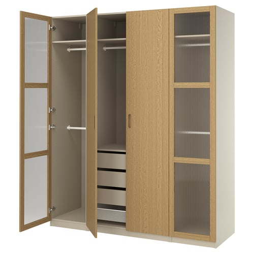 PAX wardrobe: light wood, glass panels, open doors showcasing shelves, rail, drawers.