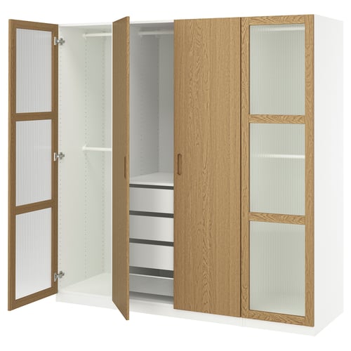 Modern wardrobe PAX with light oak finish, glass panels, and soft-closing doors.