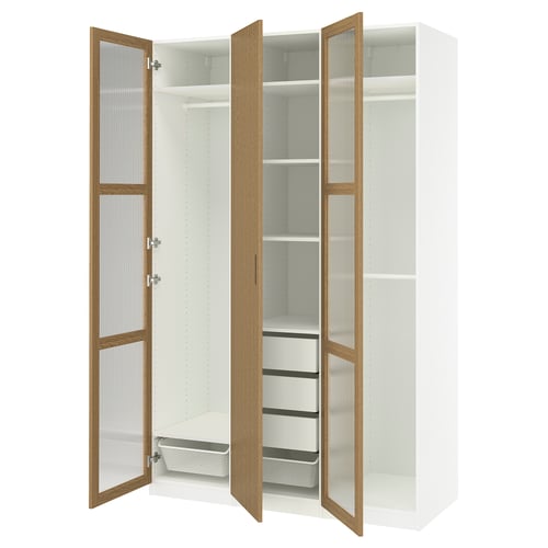 White ikea PAX wardrobe with oak doors, mesh basket, and shelves, wall-mounted.