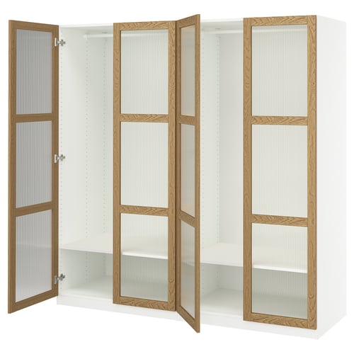 White PAX wardrobe with three sections, light wood trim, and one door open, hinges visible.