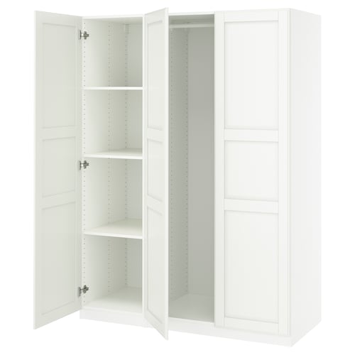 Depicts an open white PAX wardrobe with multiple shelves and no contents.