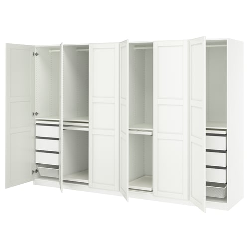 White PAX wardrobe with open doors, shelves, drawers, and compartments.