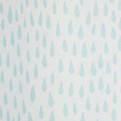 Turquoise drop patterned shower curtain, made from recycled polyester, hanging smoothly.