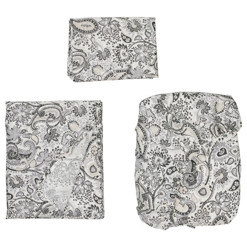 RODGERSIA bedding in black & white paisley. It a comforter and sheets, with intricate floral patterns.