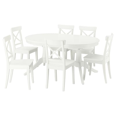 White ROSENTORP dining set: round extendable table with 6 matching chairs, solid wood and painted surfaces.