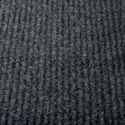 Close-up view of soft, textured RUNNEN floor decking in black, showcasing its quality and texture.