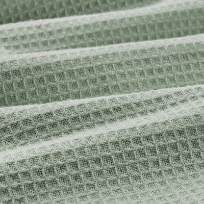 Close-up of fine texture towels, showcasing intricate weave and soft fibres.