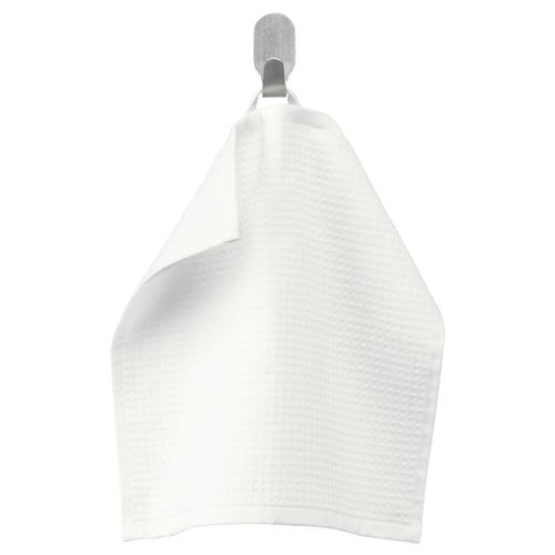 SALVIKEN white cotton towel with waffle and terry textures. Hangs on a hook, rectangular shape.