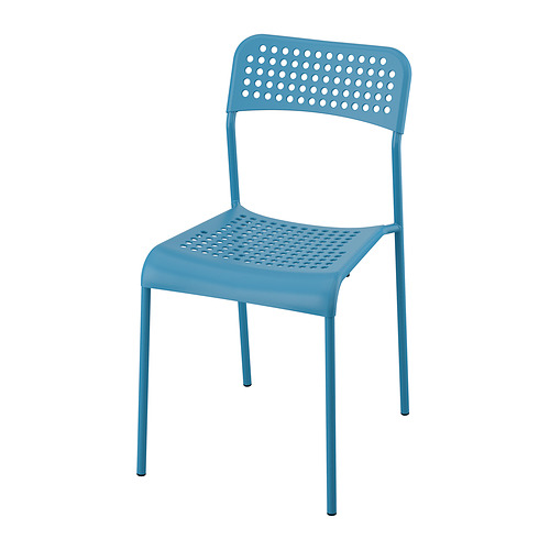 A blue sandberg chair with a perforated seat and backrest, designed for stacking and easy cleaning.
