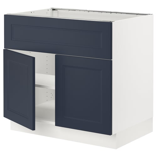 SEKTION kitchen unit in blue with two open doors, adjustable shelves, and a white base.