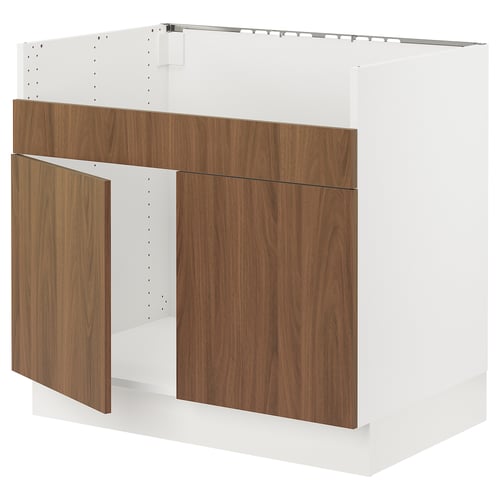 SEKTION kitchen unit; white base, brown wood doors; modern design.