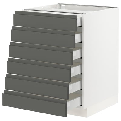 White kitchen cabinet with eight grey drawers, modern design with handle-less fronts.