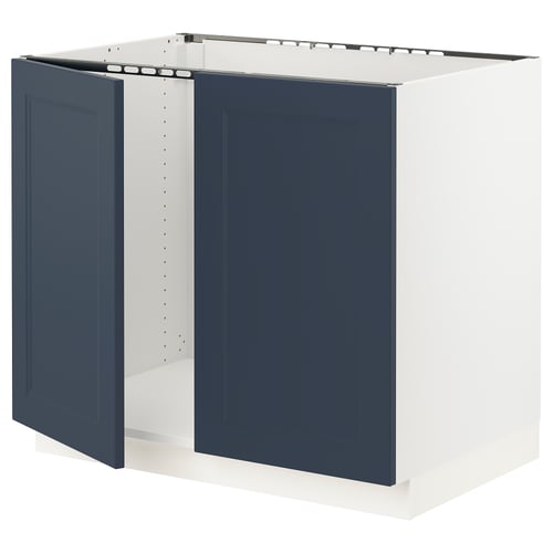 Blue kitchen cabinet with white frame, modern design.