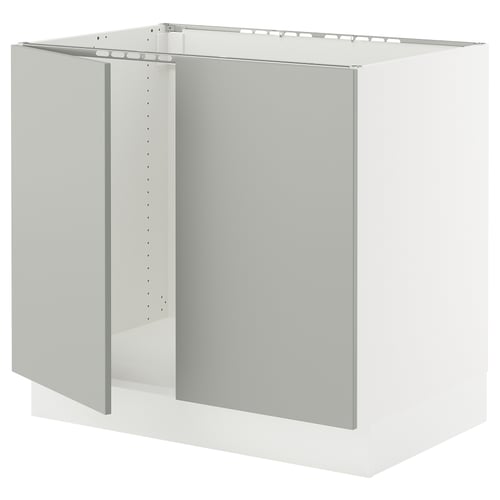 White SEKTION kitchen cabinet, modern light grey tone, square design, snap-on hinges.