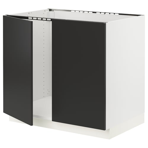 Black & white SEKTION kitchen cabinet. Glossy black base, matte black drawers, white frame, minimalist design.