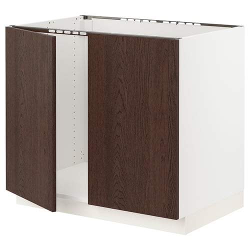 SEKTION kitchen unit - dark brown wood with white frame.
