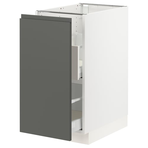 A modern, grey IKEA SEKTION kitchen cabinet with a smooth, white interior and adjustable shelves.