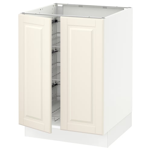 SEKTION kitchen cabinet in off-white with bevelled edges, featuring wire storage baskets and a traditional design.