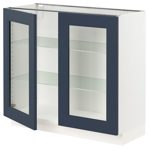 SEKTION kitchen cabinet with blue glass doors, white frame, adjustable shelves.