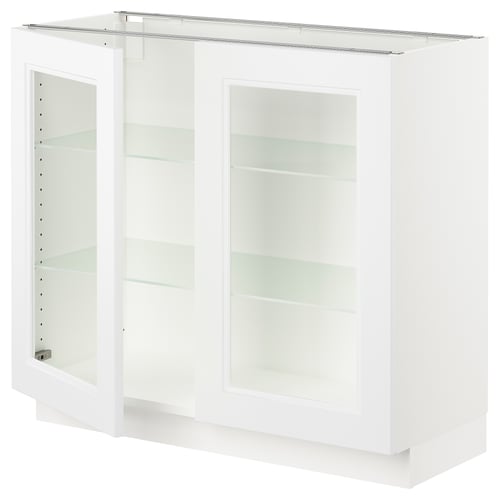 A white ikea SEKTION kitchen cabinet with glass doors and metal shelves.