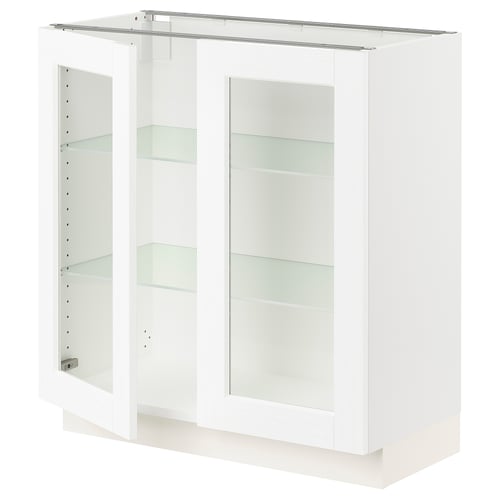 SEKTION white cabinet with glass doors and shelves.